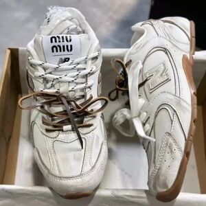 New Balance White Sneakers with Brown Accents